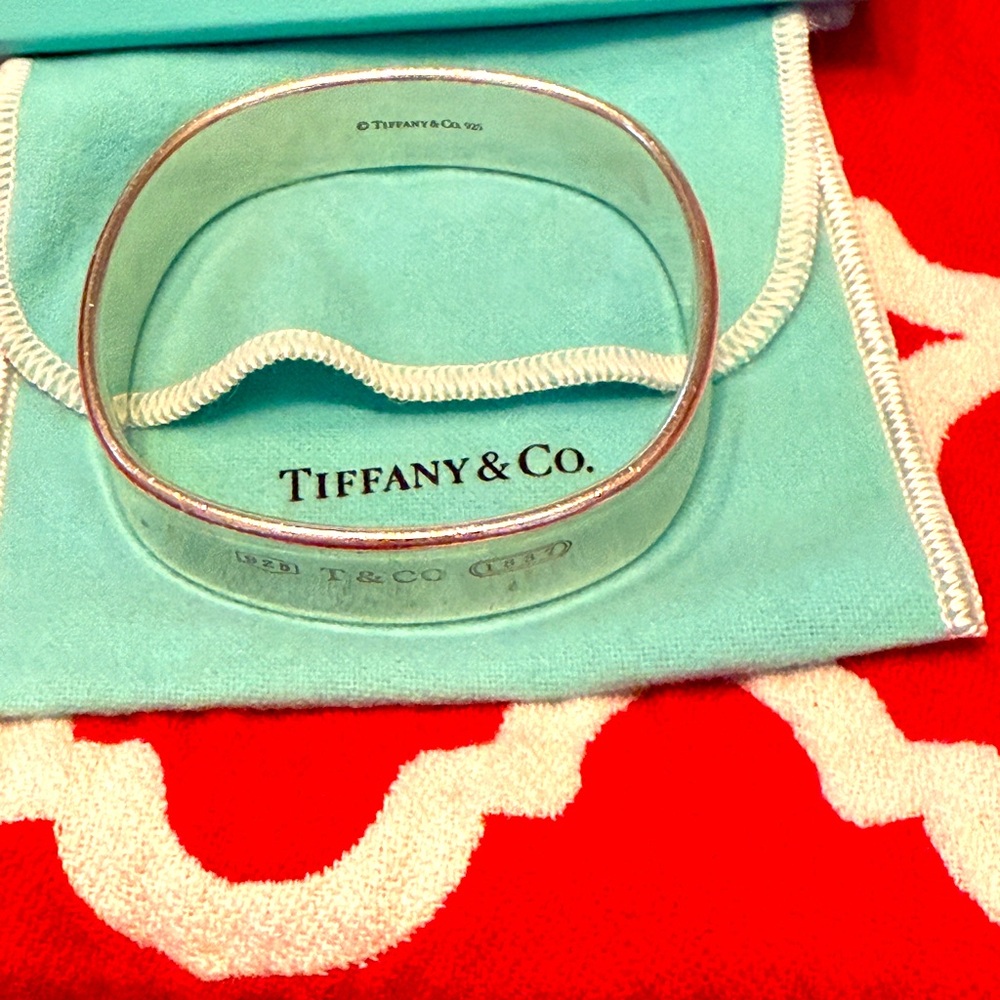 Tiffany & Co sterling silver bangle bracelet stamped 925 T&CO 1837 on outside